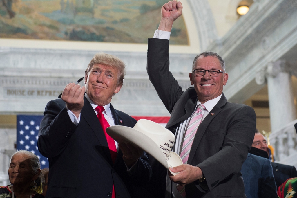San Juan County Commissioner Bruce Adams poses with then-President Trump in 2017. 