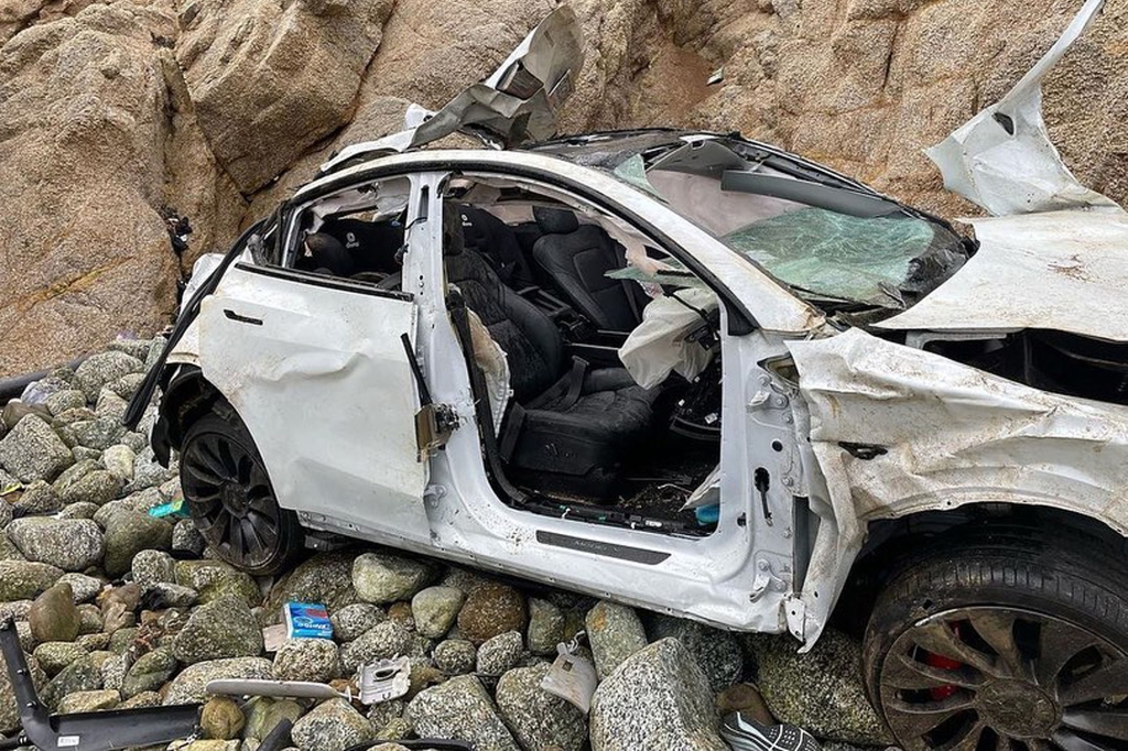 Crashed Tesla after 250-foot plunge