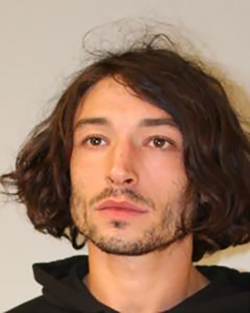 Ezra Miller is seen in a police booking photo after their arrest for second-degree assault on April 19, 2022 in Pahoa, Hawaii.