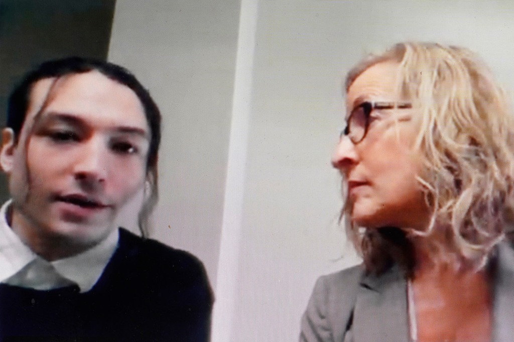 Ezra Miller, left, is seated with attorney Lisa Shelkrot, right, as they appear Monday, Oct. 17, 2022, in a livestream video remotely from Burlington, Vt., during Miller's arraignment at superior court