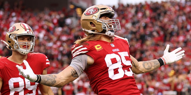 George Kittle #85 of the San Francisco 49ers celebrates after scoring a touchdown during the third quarter against the Arizona Cardinals at Levi's Stadium on January 08, 2023 in Santa Clara, California.