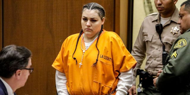 Heather Maxine Barron, who was indicted for the torture and murder of her 10-year-old son Anthony Avalos in Lancaster, walks into court for a pretrial hearing Feb. 27, 2018, in Los Angeles Criminal Court.