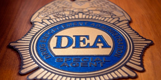 A logo reading DEA Special Agent is pictured in the Office of the US Drug Enforcement Administration (DEA) on  May 29, 2019 in New York City.