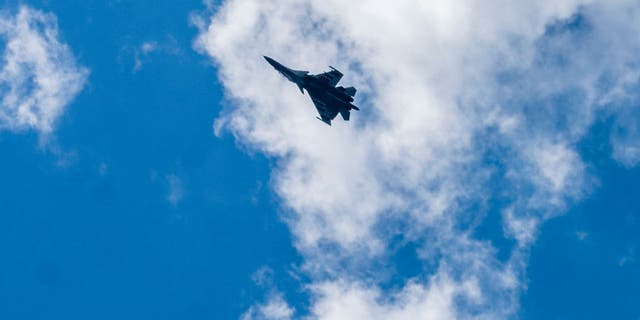 An Indian fighter plane flies toward Leh, bordering China, in Gagangir, India, on June 19, 2020.