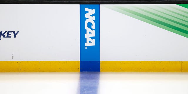 The NCAA logo on the blue line during a Frozen Four semifinal between the Michigan Wolverines and Denver Pioneers April 7, 2022, at TD Garden in Boston. 