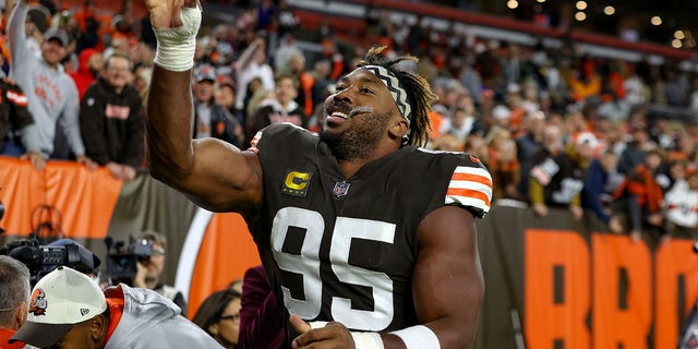 Cleveland Browns defensive end Myles Garrett (95) throws his glove into the stands as he leaves the field following the game between the Pittsburgh Steelers and Cleveland Browns on September 22, 2022, at FirstEnergy Stadium in Cleveland, OH. 