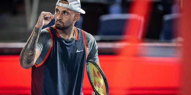 Nick Kyrgios of Australia reacts after a point against Tseng Chun-hsin of Taiwan during their men's singles match at the Japan Open tennis tournament in Tokyo Oct. 4, 2022. 