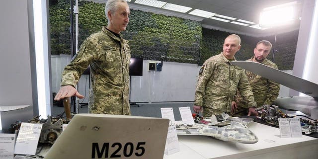 Parts of unmanned aerial vehicles Orlan-10, Granat-3, Shahed-136 and Eleron-3-SV, used by the Russia against Ukraine, are seen during a media briefing of the Security and Defense Forces of Ukraine in Kyiv, Ukraine on Dec. 15, 2022, amid Russian invasion of Ukraine. Security and Defense Forces of Ukraine representatives held a media briefing about situation on the Russian-Ukrainian war and the security situation in Ukraine. 