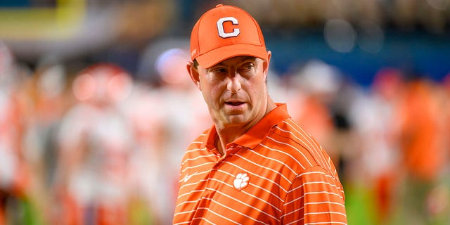 Clemson head coach Dabo Swinney watches players on the field before the Capital One Orange Bowl against the Tennessee Volunteers Dec. 30, 2022, at Hard Rock Stadium in Miami Gardens, Fla. 