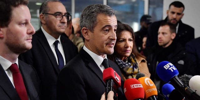 French Interior Minister Gerald Darmanin (C) talks to the press next to Junior Minister for Transports Clement Beaune (L), Paris' Mayor Anne Hidalgo (4thL) and Paris Police Prefect Laurent Nunez (2ndL) at Paris' Gare du Nord train station, after several people were wounded.