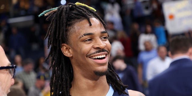 Ja Morant, #12 of the Memphis Grizzlies, is interviewed after the game against the San Antonio Spurs on January 11, 2023, at FedExForum in Memphis, Tennessee. 