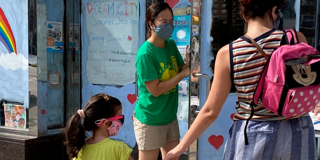 Daycare drop off, phase 4 reopening during Coronavirus Pandemic, Queens, New York. (Photo by: Lindsey Nicholson/Education Images/Universal Images Group via Getty Images)