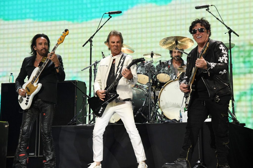 (L-R) Marco Mendoza, Jonathan Cain, Deen Castronovo, and Neal Schon of Journey perform onstage during the 2021 iHeartRadio Music Festival on September 18, 2021.