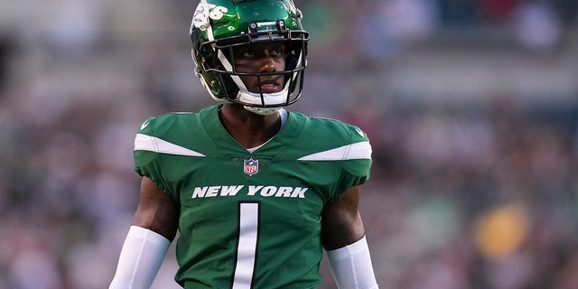 Sauce Gardner #1 of the New York Jets looks on against the Philadelphia Eagles during the preseason game at Lincoln Financial Field on August 12, 2022, in Philadelphia, Pennsylvania. The Jets defeated the Eagles 24-21.