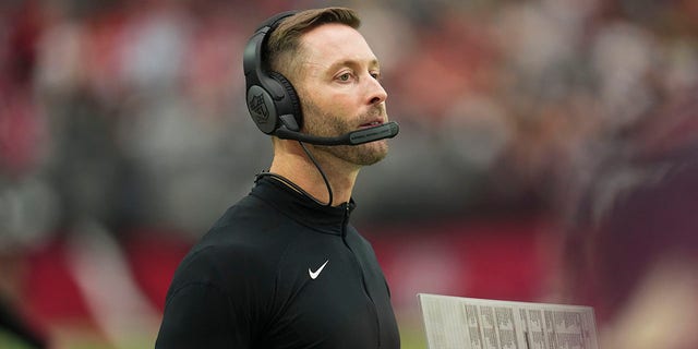 Head coach Kliff Kingsbury of the Arizona Cardinals looks down the field against the Philadelphia Eagles at State Farm Stadium Oct. 9, 2022, in Glendale, Ariz. 