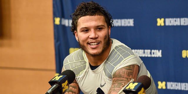 Blake Corum #2 of the Michigan Wolverines speaks to the press after a college football game against the Michigan State Spartans at Michigan Stadium on Oct. 29, 2022 in Ann Arbor, Michigan. The Michigan Wolverines won the game 29-7 over the Michigan State Spartans. 