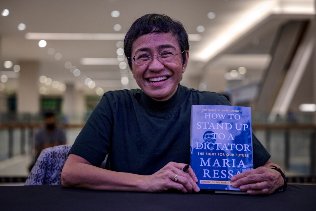 Maria Ressa poses for photographers during the launch of her new book "How to Stand Up to a Dictator" on Dec. 10, 2022 in Pasig, Metro Manila, Philippines. 
