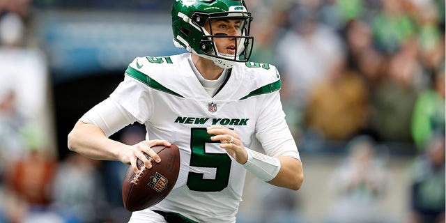 Mike White of the New York Jets looks to pass during the first quarter against the Seattle Seahawks at Lumen Field Jan. 1, 2023, in Seattle. 