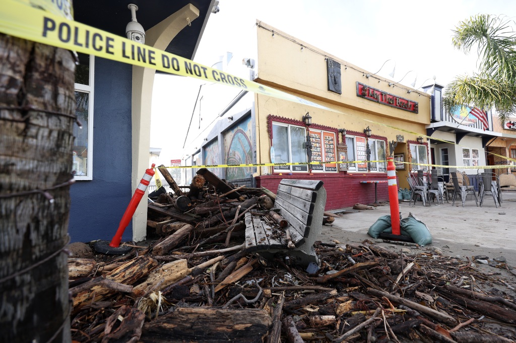 Debris piled up outside a restaurant in Capitola, California on Jan. 6, 2023.