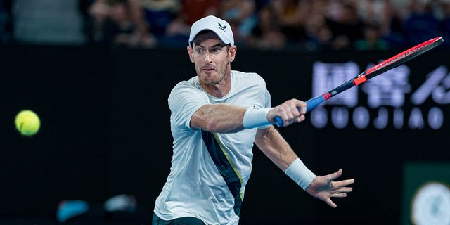 Andy Murray plays a backhand against Matteo Berrettini during the Australian Open on Jan. 17, 2023, in Melbourne.