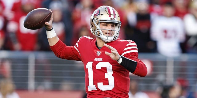 Brock Purdy #13 of the San Francisco 49ers passes during an NFL divisional round playoff football game between the San Francisco 49ers and the Dallas Cowboys at Levi's Stadium on January 22, 2023, in Santa Clara, California. 