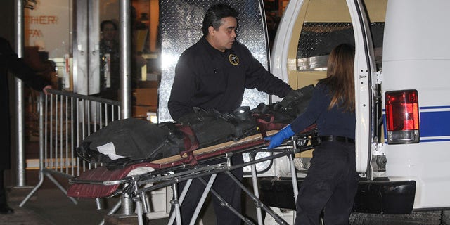 A gurney allegedly with the with body of socialite Gigi Jordan's 8-year-old son Jude Michael Mirra, is wheeled out of the Peninsula Hotel, Feb. 5, 2010, in New York City.