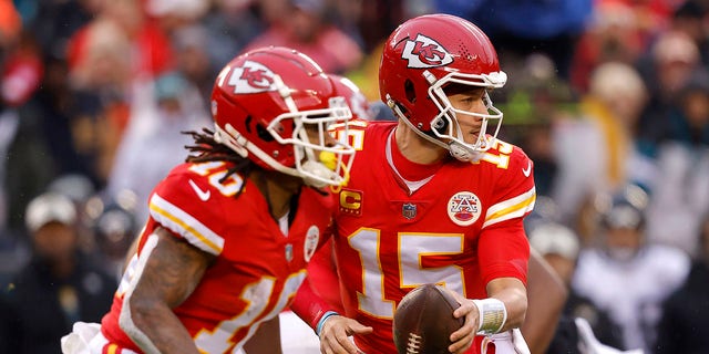 Patrick Mahomes (15) of the Kansas City Chiefs drops back against the Jacksonville Jaguars during the first quarter of an AFC divisional playoff game at Arrowhead Stadium Jan. 21, 2023, in Kansas City, Mo.