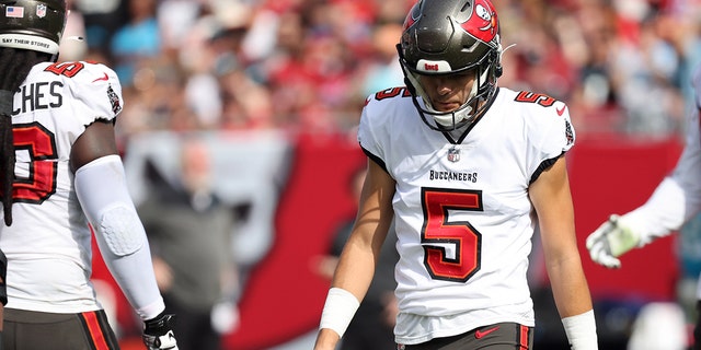 Jan 1, 2023; Tampa, Florida, USA;  Tampa Bay Buccaneers punter Jake Camarda (5) looks down after he missed the field goal against the Carolina Panthers during the first half at Raymond James Stadium.