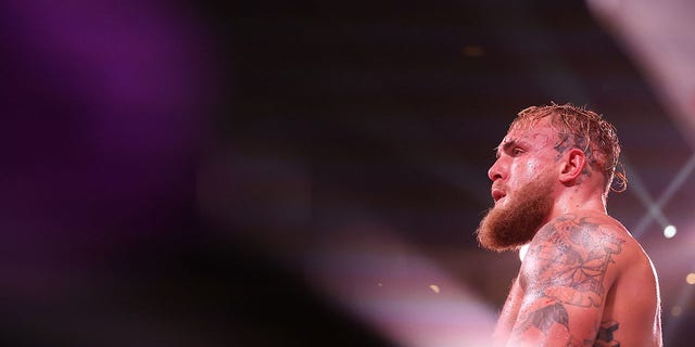 Jake Paul stands in the corner during his cruiserweight bout against Anderson Silva at Desert Diamond Arena on Oct. 29, 2022 in Glendale, Arizona.