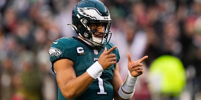 Philadelphia Eagles quarterback Jalen Hurts gestures during the first half of the NFC Championship NFL football game between the Philadelphia Eagles and the San Francisco 49ers on Sunday, Jan. 29, 2023, in Philadelphia.