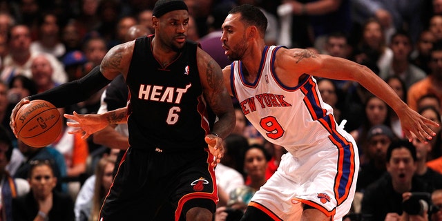 LeBron James #6 of the Miami Heat looks to pass in the first half against Jared Jeffries of the New York Knicks in Game 4 of the Eastern Conference quarterfinals in the 2012 NBA Playoffs on May 6, 2012, at Madison Square Garden in New York.