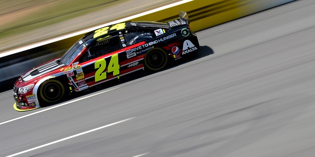 Jeff Gordon practices for the NASCAR Sprint Cup Series Pocono 400 at Pocono Raceway on June 7, 2014, in Long Pond, Pennsylvania.