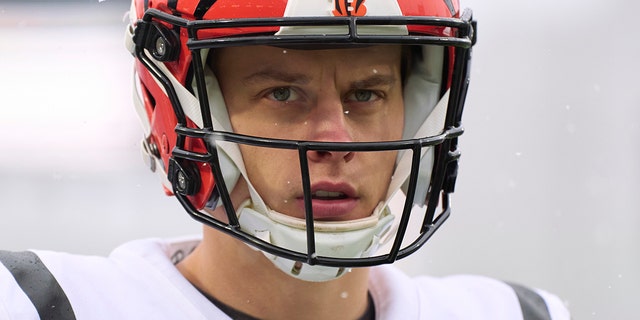 Joe Burrow of the Cincinnati Bengals warms up before kickoff against the Buffalo Bills at Highmark Stadium on Jan. 22, 2023, in Orchard Park, New York.