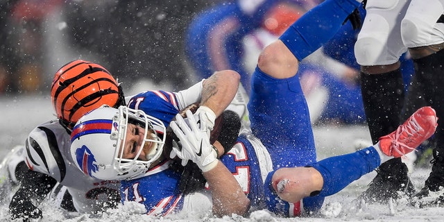 Buffalo Bills wide receiver Cole Beasley makes a catch against the Cincinnati Bengals during the third quarter of an NFL division round playoff game, Sunday, Jan. 22, 2023, in Orchard Park, New York.