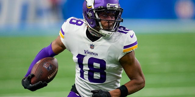 Minnesota Vikings' Justin Jefferson runs during the first half of an NFL football game against the Detroit Lions Sunday, Dec. 11, 2022, in Detroit. 