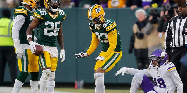 Jan 1, 2023; Green Bay, Wisconsin, USA; Green Bay Packers cornerback Jaire Alexander does the Griddy after breaking up a pass intended for Minnesota Vikings wide receiver Justin Jefferson (18) at Lambeau Field.