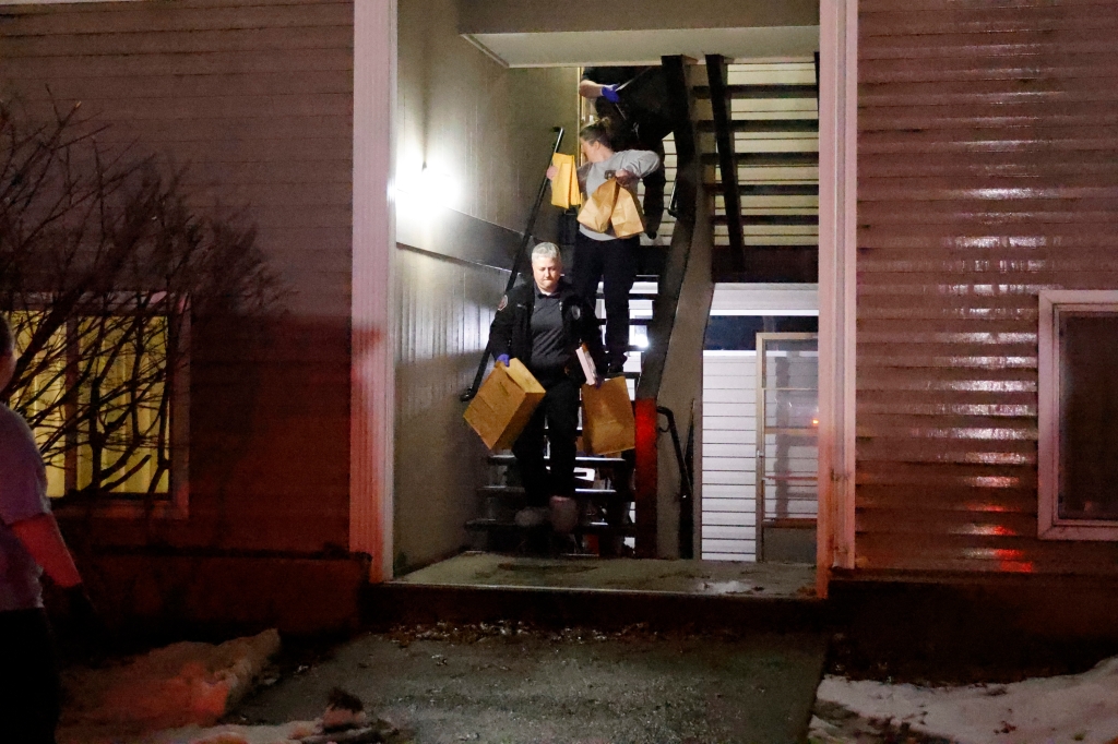 State Police Forensics Unit leave with bags of evidence from the dorm room at apartment 201 at the G building in Washington State university at Steptot Village, where the suspect Bryan Koehberger lived, who is accused of murdering four University of Idaho students on November 13th..Idaho (nypostinhouse (Kevin C. Downs for The New York Post ), December 30 2022