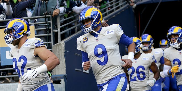 Quarterback Matthew Stafford (9) of the Los Angeles Rams takes the field before the start of a game against the Seattle Seahawks at Lumen Field Oct. 7, 2021, in Seattle.