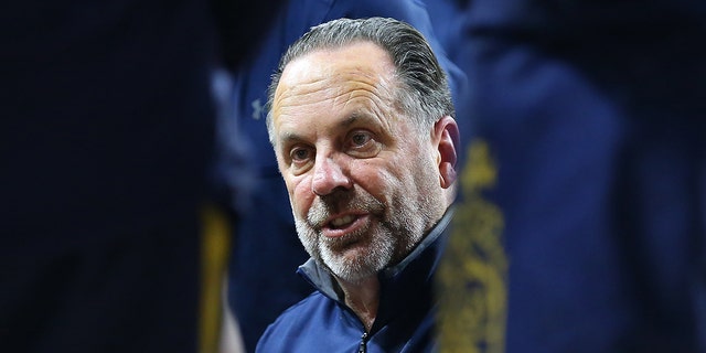 Notre Dame Fighting Irish head coach Mike Brey during a timeout in a game against the Boston College Eagles Dec. 3, 2021, at Conte Forum in Chestnut Hill, Mass.