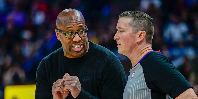 Sacramento Kings head coach Mike Brown discusses a call with a referee in their game against the Utah Jazz during the fourth quarter at Vivint Arena in Salt Lake City Jan. 3, 2023.