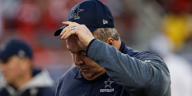 Dallas Cowboys head coach Mike McCarthy walks off the field after the first half of an NFL divisional round playoff football game against the San Francisco 49ers in Santa Clara, California, Sunday, Jan. 22, 2023. 