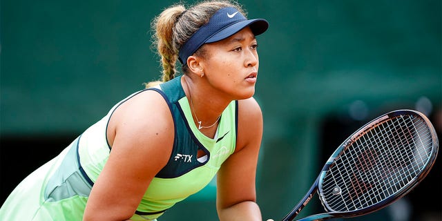 Naomi Osaka plays against Amanda Anisimova during the French Open at Roland Garros on May 23, 2022, in Paris.