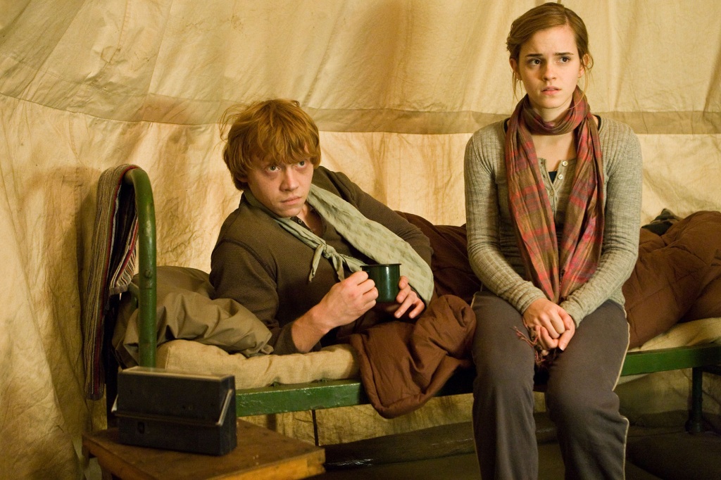RUPERT GRINT as Ron Weasley and EMMA WATSON as Hermione Granger