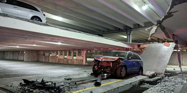 A vehicle that crashed into a wall of a parking garage at TidalHealth Peninsula Regional Hospital in Salisbury, Maryland caused part of the employee garage to collapse on Sunday morning.