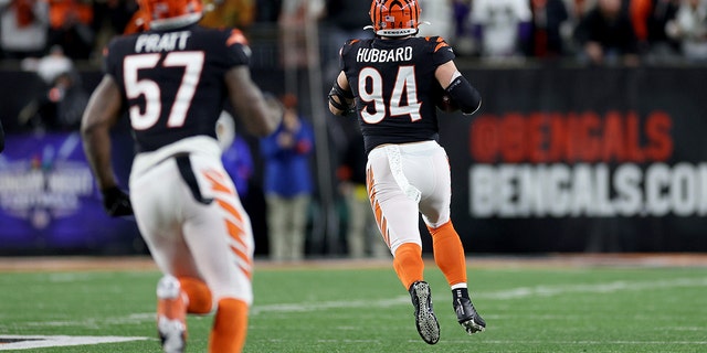 Sam Hubbard of the Bengals runs 98 yards for a touchdown after recovering a fumble by Tyler Huntley of the Baltimore Ravens at Paycor Stadium on Jan. 15, 2023, in Cincinnati.