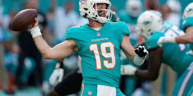 Miami Dolphins quarterback Skylar Thompson (19) aims a pass during the first half of an NFL football game against the New York Jets, Sunday, Jan. 8, 2023, in Miami Gardens, Florida.