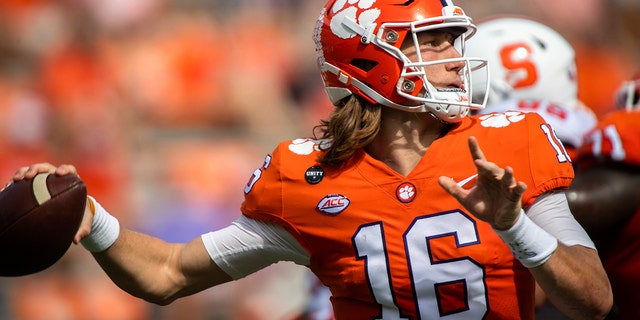 Clemson quarterback Trevor Lawrence (16) makes a pass during an NCAA college football game against Syracuse in Clemson, S.C., on Saturday, Oct. 24, 2020. 
