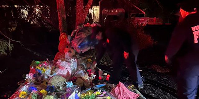 Chief John Kelley, Wareham Fire Department attends a candlelight vigil for Cora Clancy, 5, and Dawson Clancy, 3, as the community sends prayers and support to the Clancy family on Jan. 26, 2023.