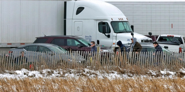 Emergency crews respond to a multi-vehicle accident in both the north and south lanes of Interstate 39/90 on Friday, Jan. 27, 2023, in Turtle, Wisconsin.