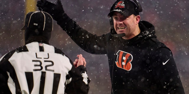 Cincinnati Bengals head coach Zac Taylor talks with an official during the Buffalo Bills game at Highmark Stadium on Jan. 22, 2023.